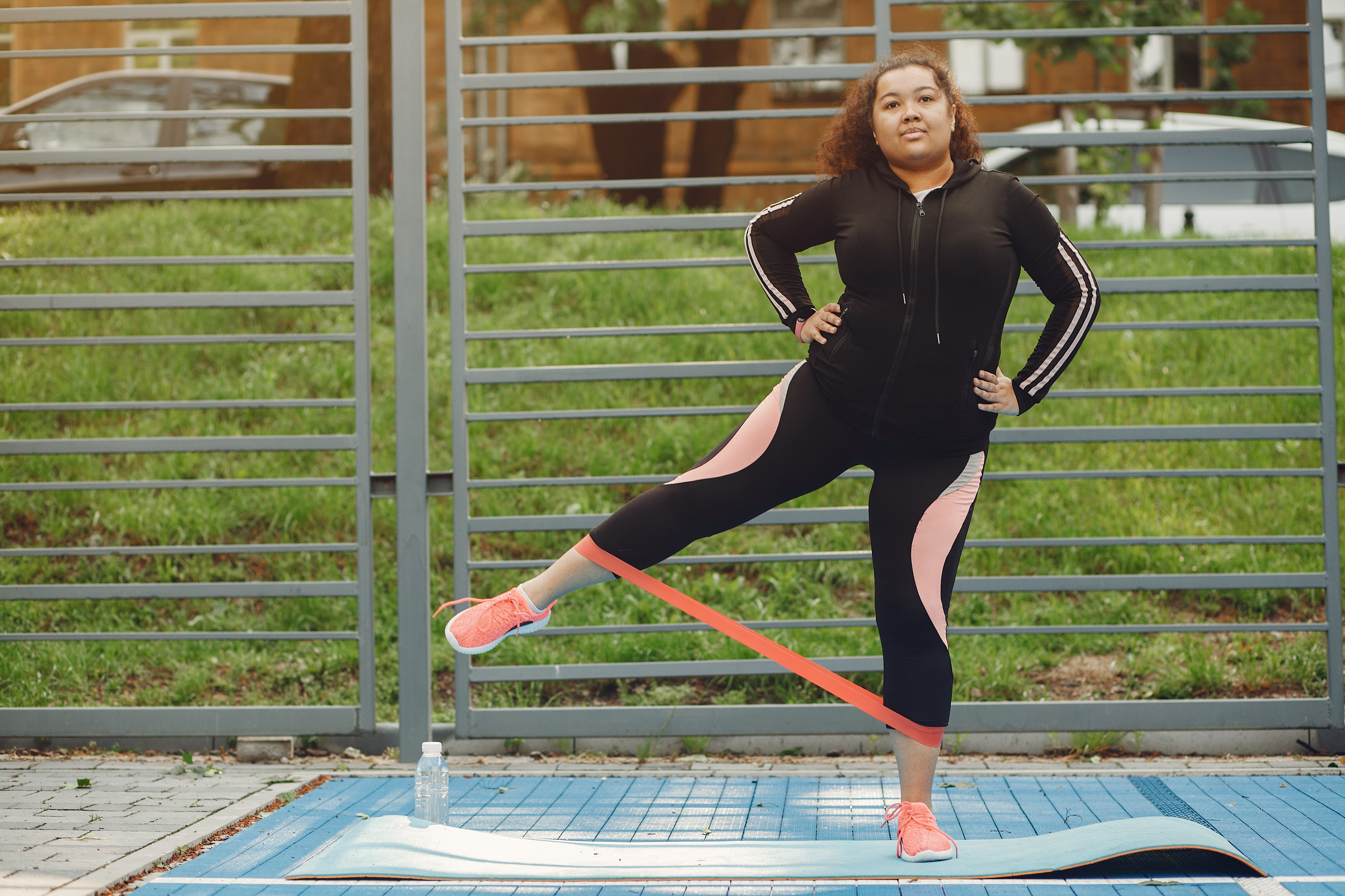 over the size of a woman doing stretching exercises